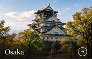 Osaka Castle among green trees and autumn color